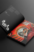 Open book with a black cover displaying the brand 'Edito' and a colorful illustration on the right page.